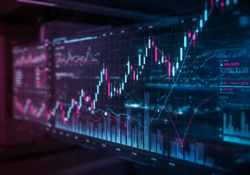 Un tablero digital con números bursátiles en rojo y verde, cruzado por una línea roja en zigzag que marca una tendencia a la baja.